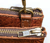 #3745 "Cibolo" Cross Body American Bison. Color Cinnamon "Cobblestone" 2 exterior zip compartments with slide in area between the 2 compartments - Dimensions: 8" H x 12 " L x 2" D